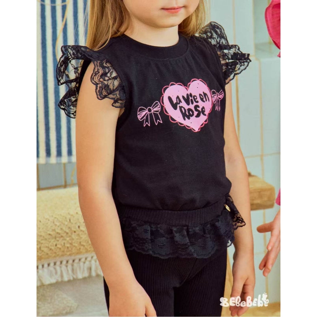 IRIS KIDS La Vie en Rose Set — kids black bow-print shirt and shorts, product photo 7 of 10
